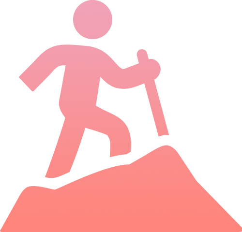 Person hiking uphill with a stick.